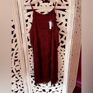 New with tags a halter fringe dress!